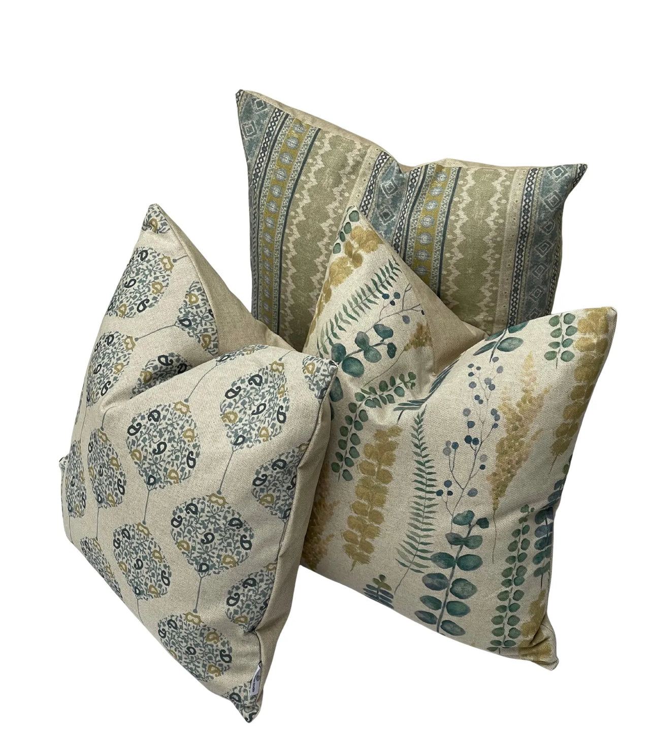 Assorted cotton-linen cushions including Eucalyptus Meadow print and coordinating designs.