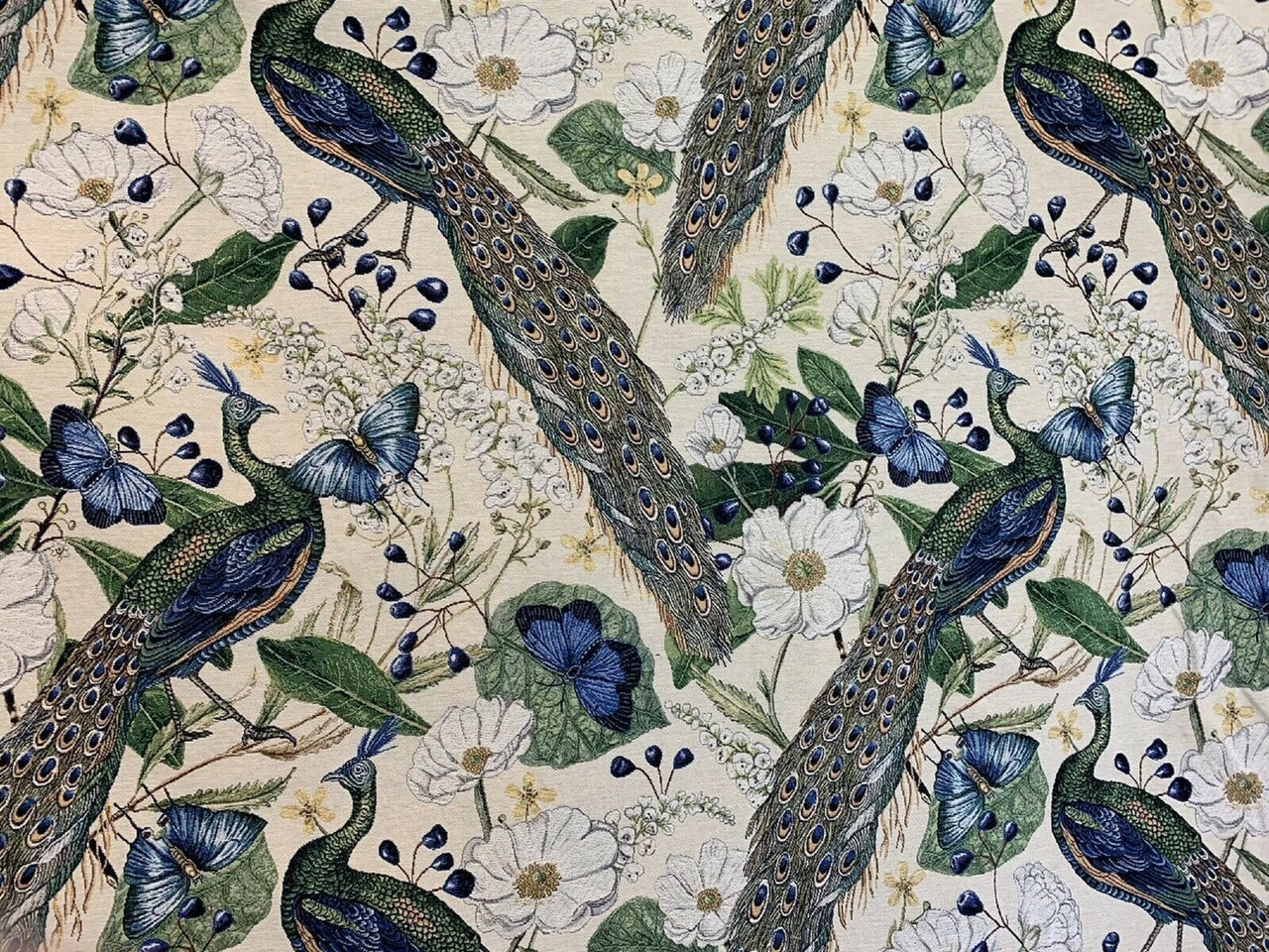 Decorative fabric with peacock and floral pattern on beige background