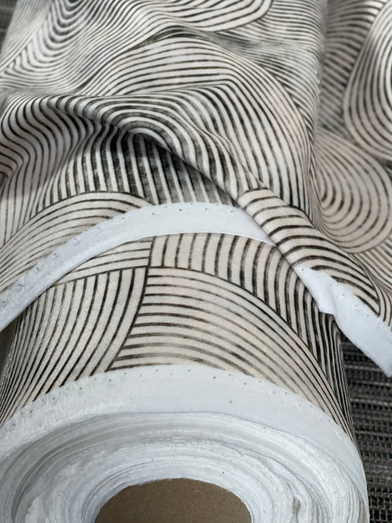 Modern light grey fabric texture for interior décor.