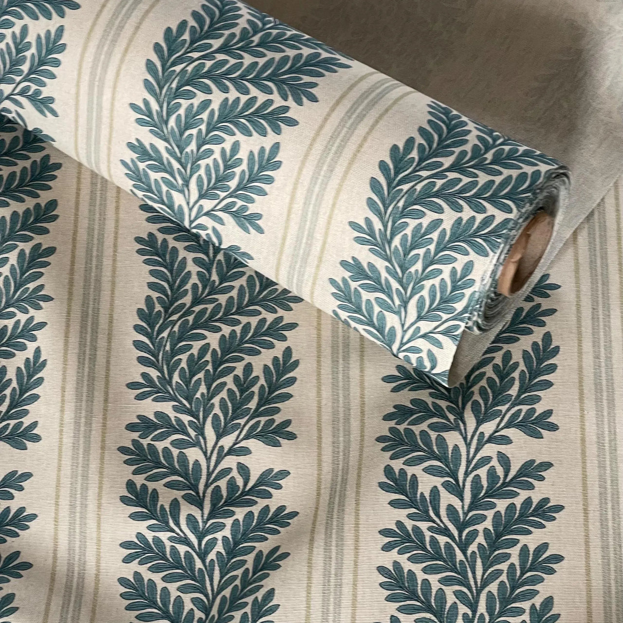 Traditional botanical stripe fabric with fern leaves in sage green