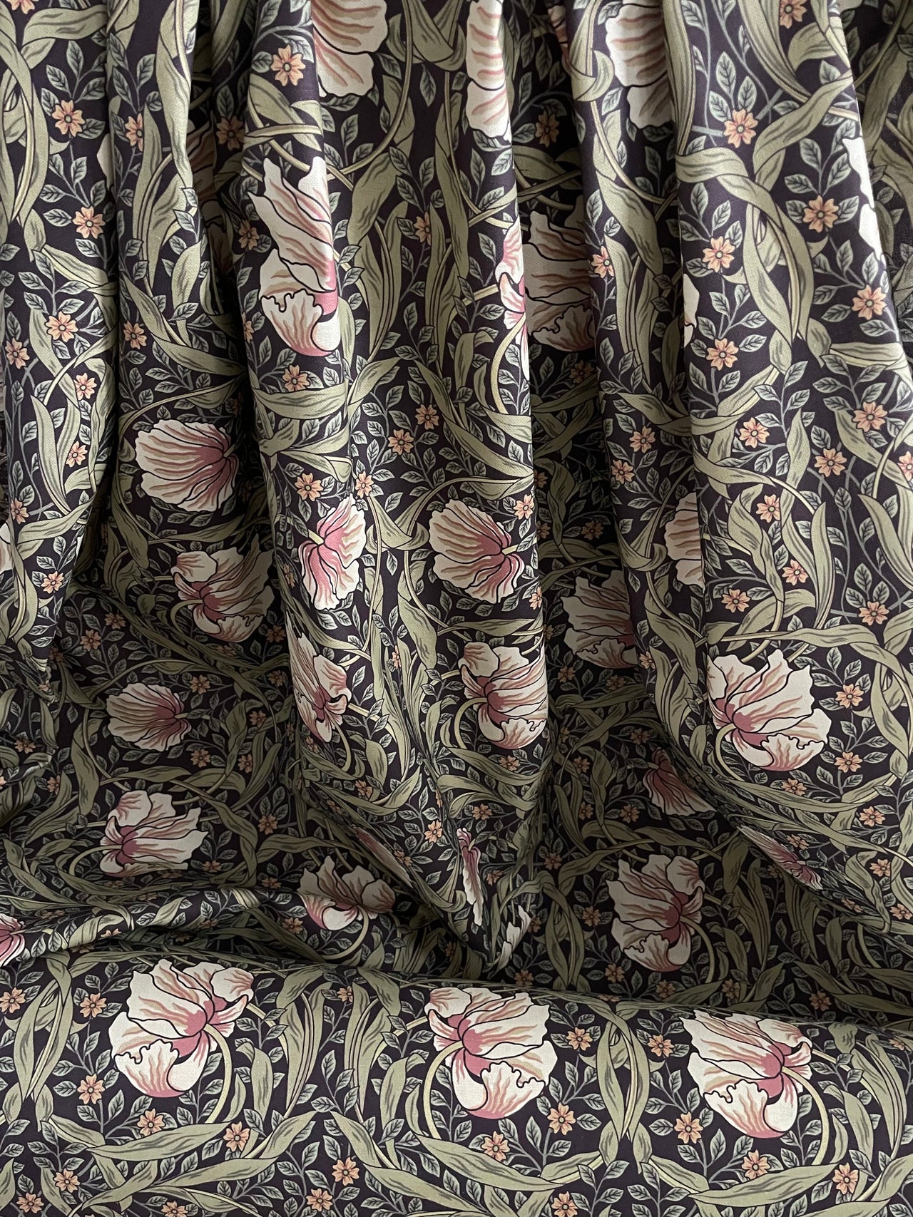 William Morris Pimpernel fabric with tulip and foliage print in cotton.