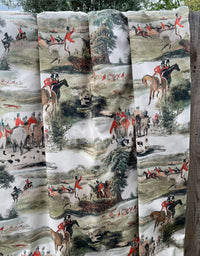 Thumbnail for Fabric with hunting scene pattern displayed on a wooden surface