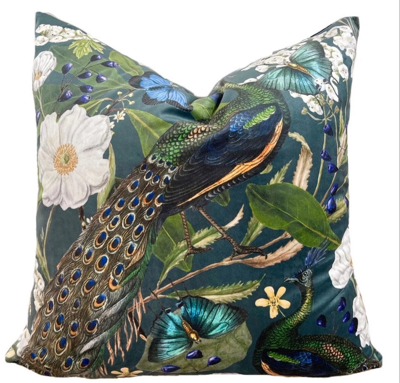 Elegant throw pillow with peacock and flower print.