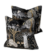Thumbnail for Black botanical throw pillow with shimmering gold details.