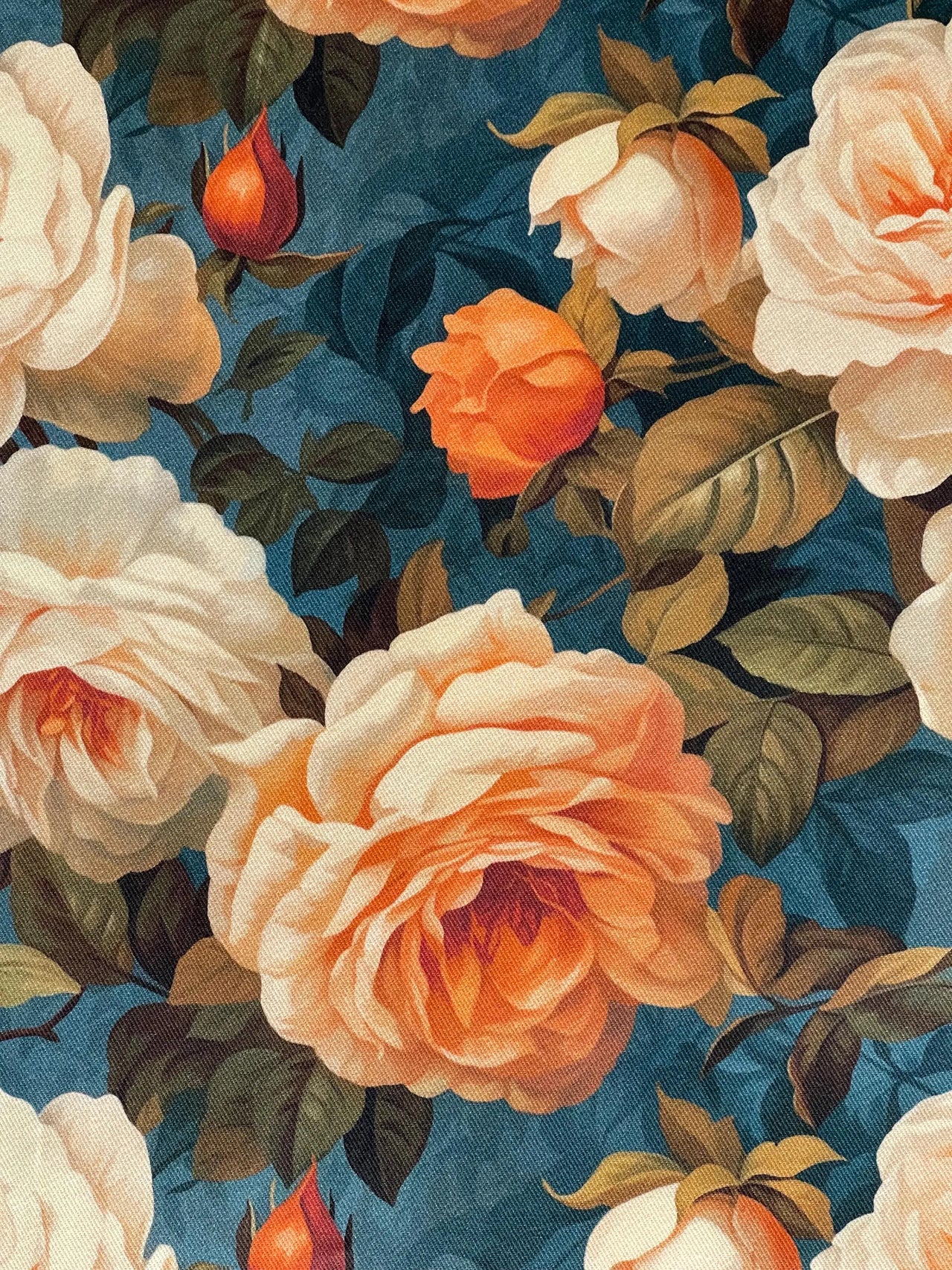 High-quality printed cotton with classic floral design – warm rose tones set against an elegant deep teal base