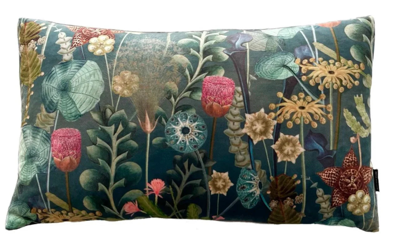 Decorative pillow with floral pattern on a blue background