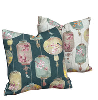 Thumbnail for Coordinating ivory and dark teal green Asian lantern cushion covers with decorative pastel floral motifs and traditional hanging lantern designs.