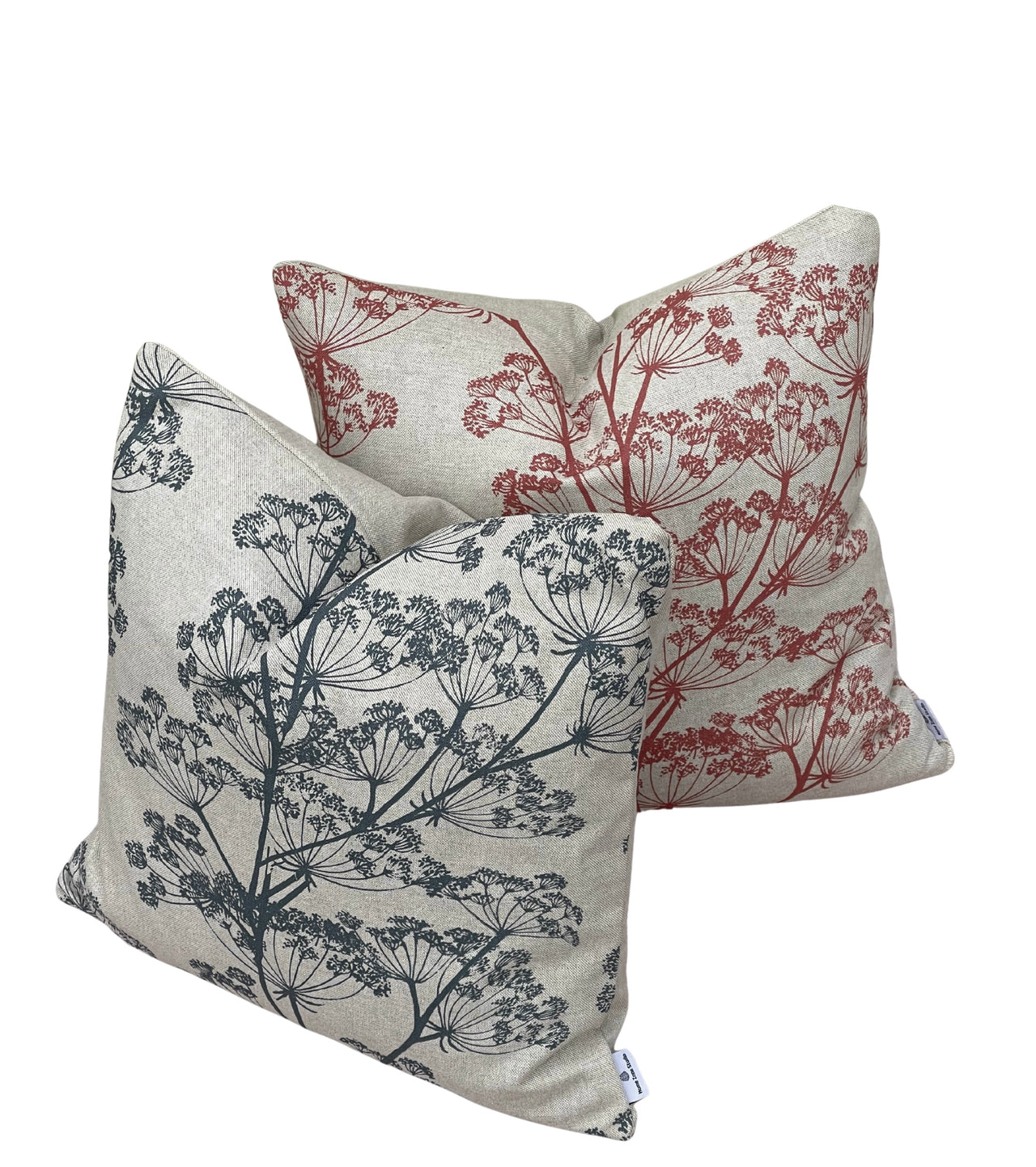 Blue and red cow parsley cushion covers with large botanical silhouettes on a natural background