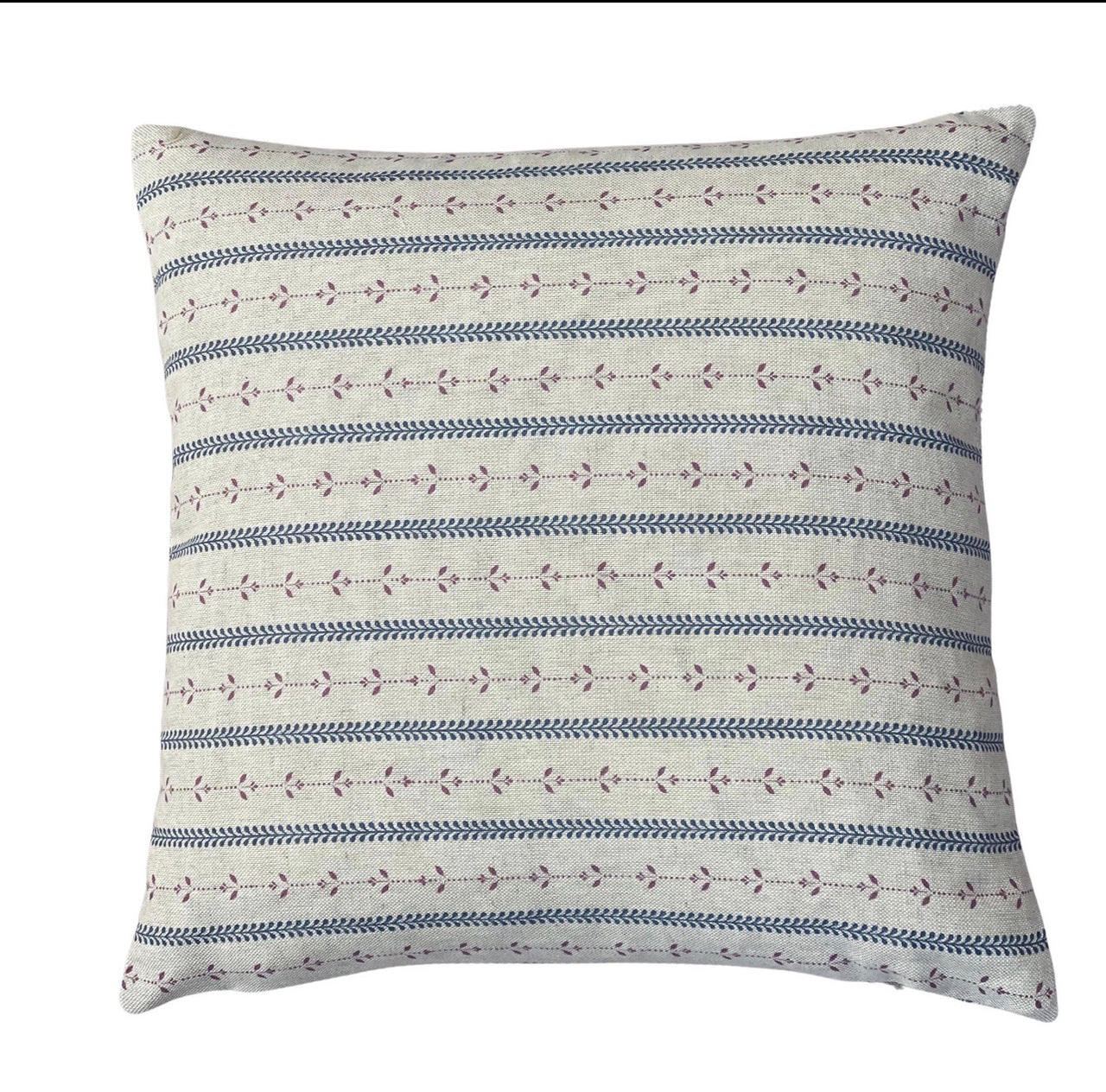 Close-up of dusty blue and mauve leafy stripes on a handmade cushion cover