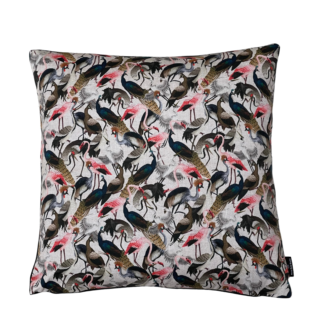 Handmade Blush Crane Garden cushion cover featuring pink cranes, navy peacocks, grey herons and exotic birds on a neutral cotton blend fabric.
