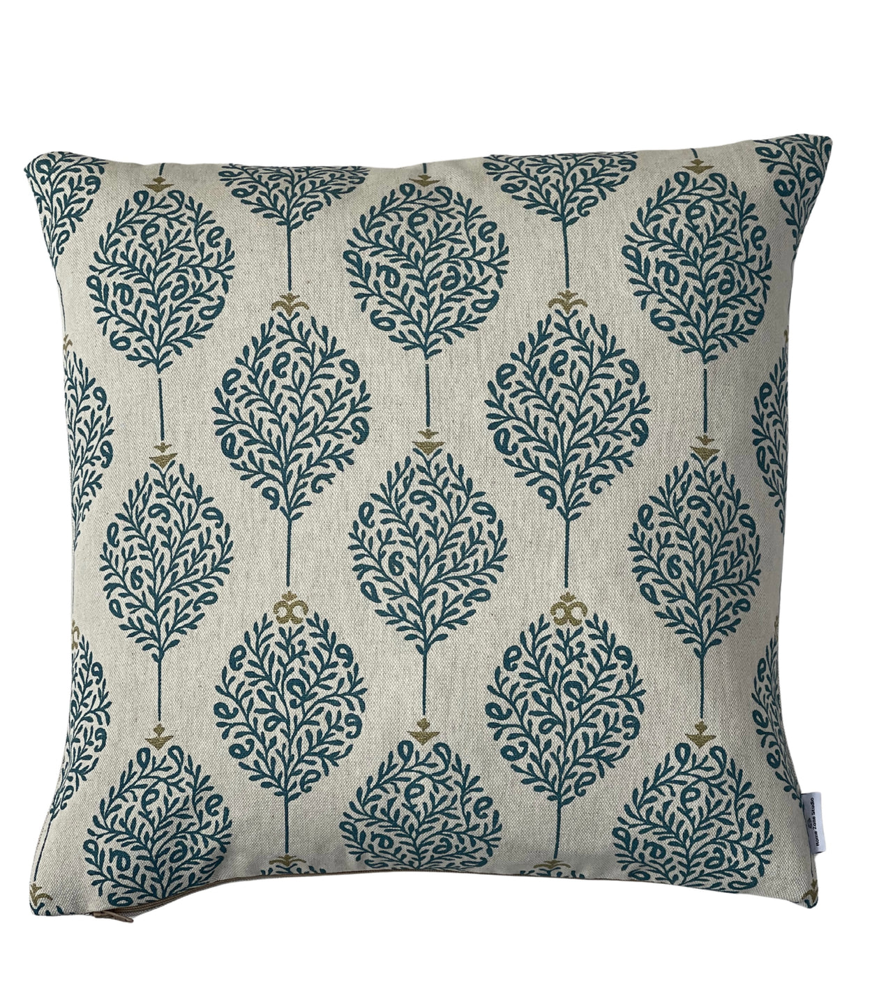 Botanical teal cushion cover with repeating leaf shapes on textured natural fabric.