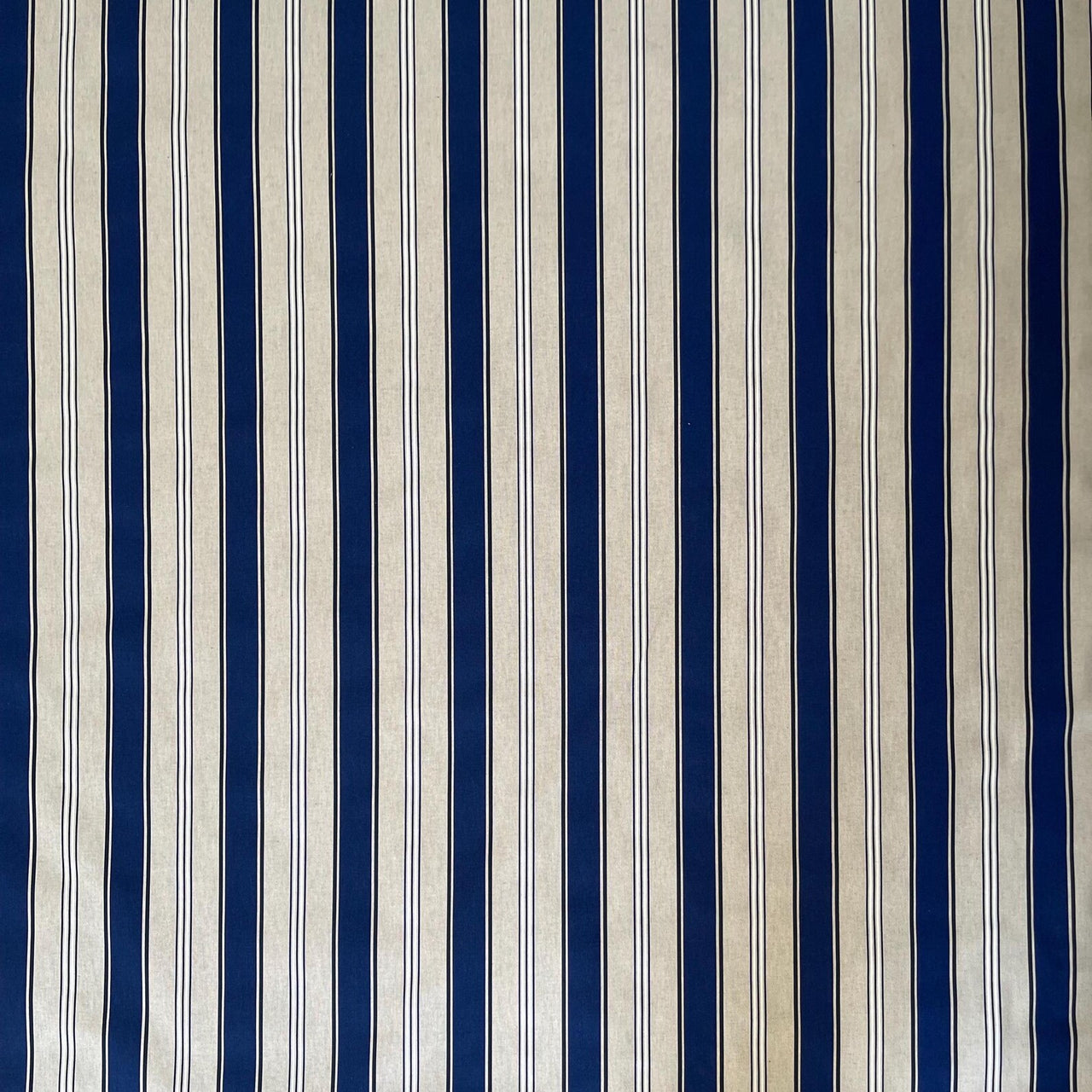 Coastal blue and beige fabric with vertical stripes