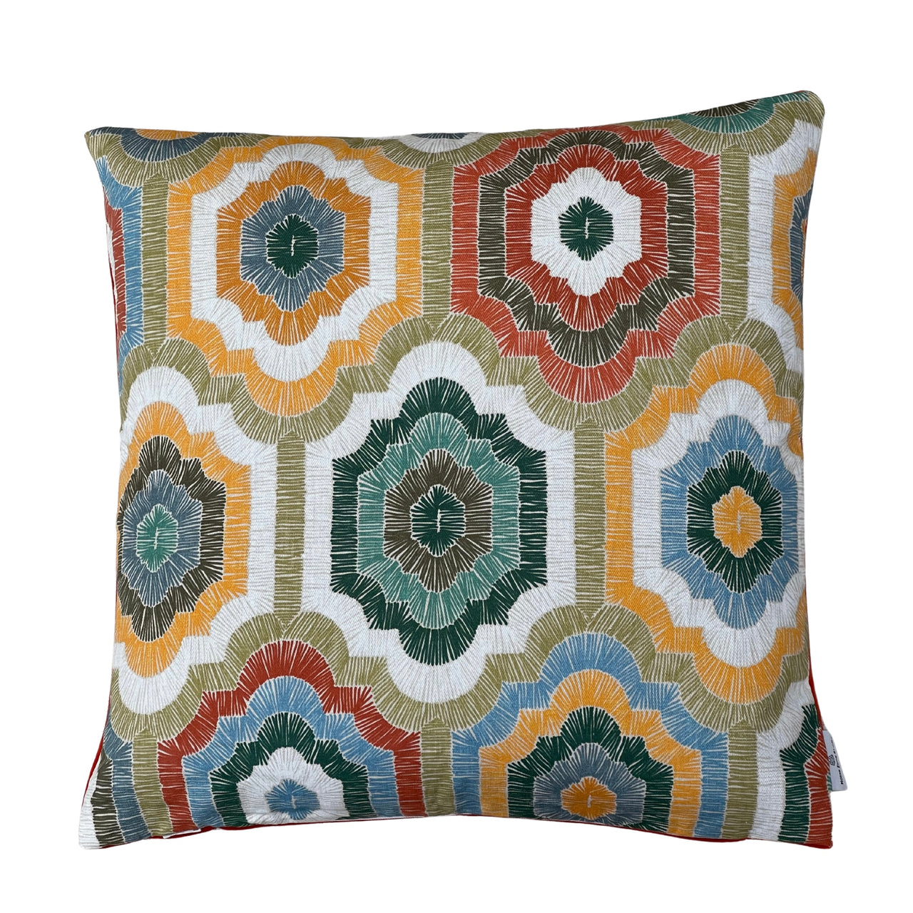 Colourful boho decorative cushion cover with bold geometric medallion shapes in teal, mustard, terracotta, olive green and blue on a light background.