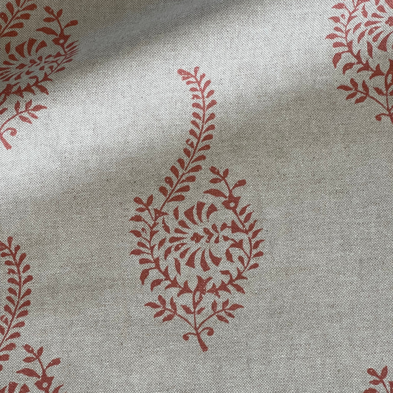 Linen look cotton blend fabric with coral buta design