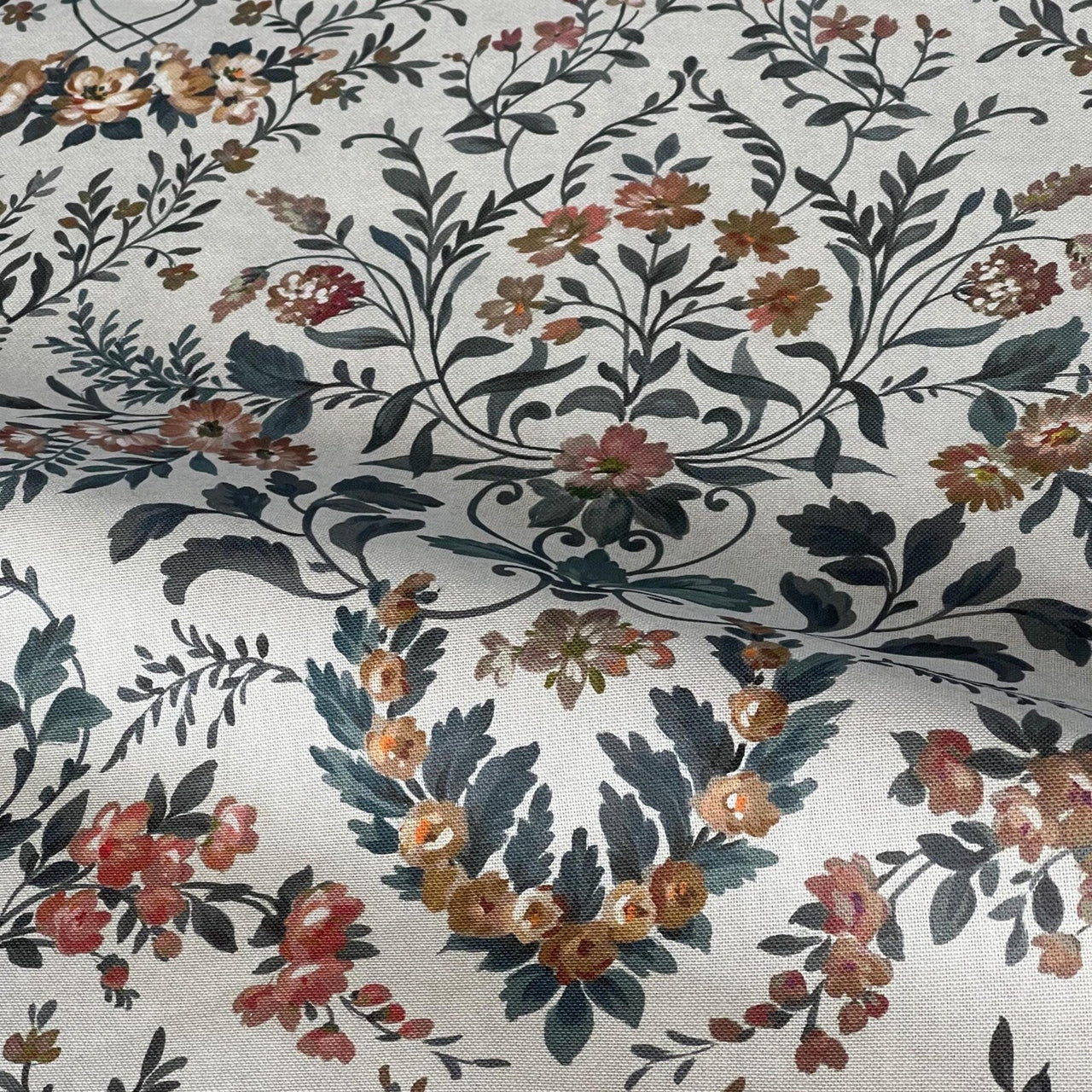 Traditional botanical fabric with scrolling foliage pattern
