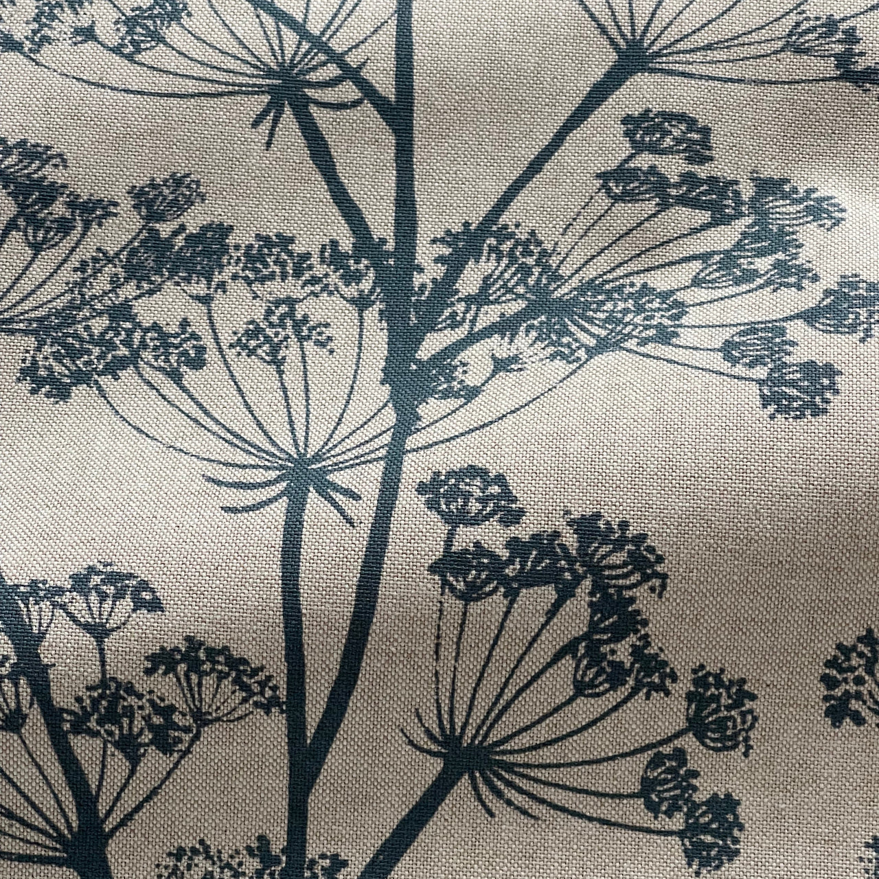 Blue floral upholstery fabric featuring delicate cow parsley wildflower design