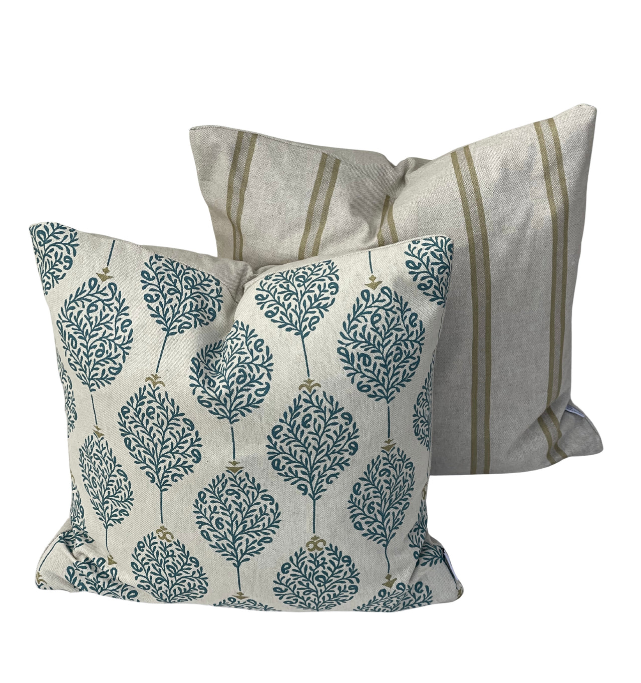 Country style cushion cover with teal botanical leaves on a soft natural linen-look base