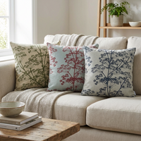 Thumbnail for Indigo, red and green cow parsley cushion covers styled on a neutral linen sofa