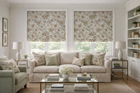 Thumbnail for Living room with floral window treatments, beige sofa, and decorative items.