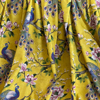Thumbnail for Rich yellow fabric with peacock and floral elements