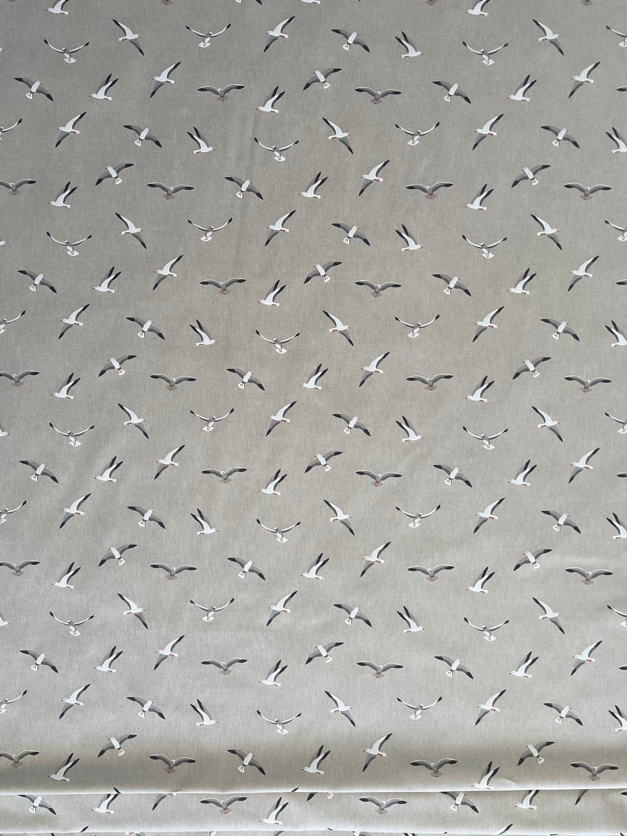 Pattern of seagulls on a gray background