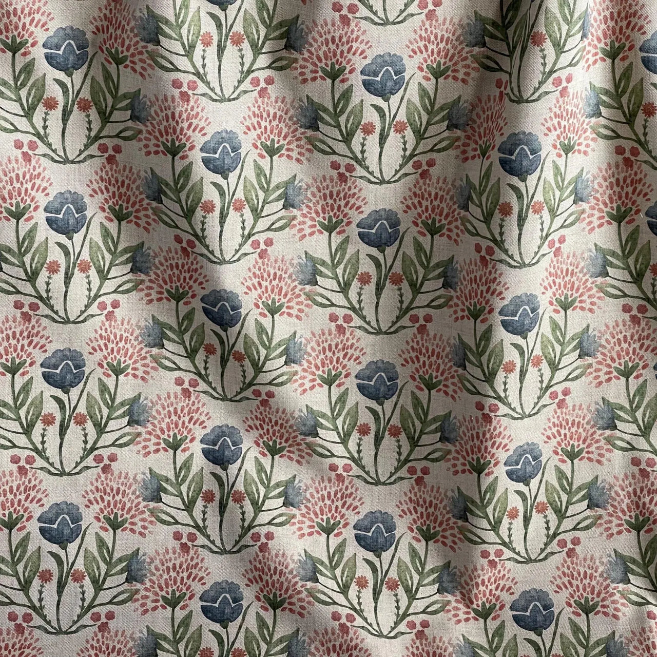 Floral drapery fabric with balanced pattern repeat and natural texture