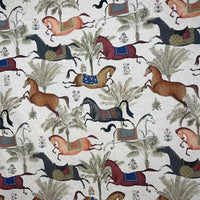 Thumbnail for Patterned fabric with horses and trees on a beige background