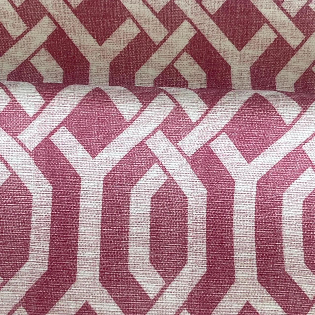 Detailed view of mauve pink cotton fabric with modern interlocking pattern – perfect for soft furnishings, blinds, and contemporary interiors.

