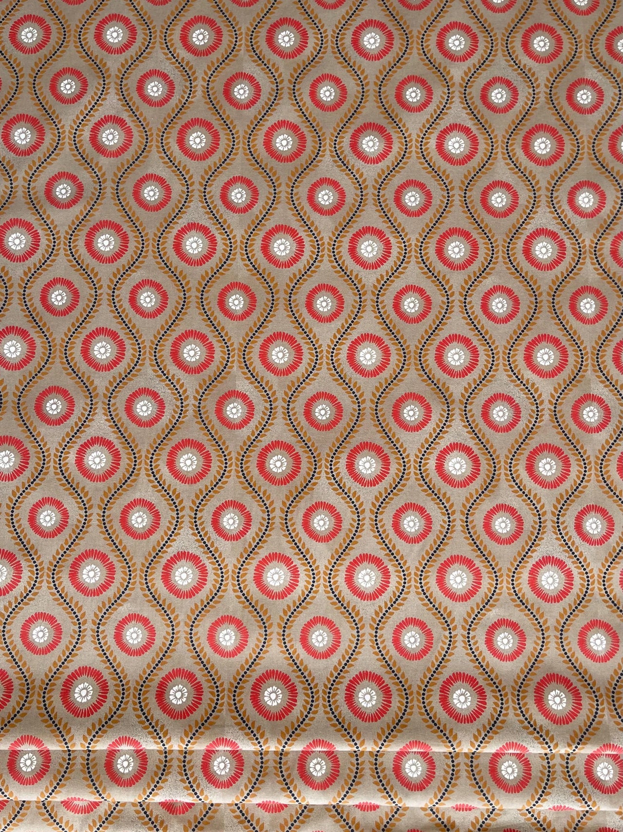 geometric boho cotton fabric with warm red gold patterns for upholstery roman blinds and vintage style interiors