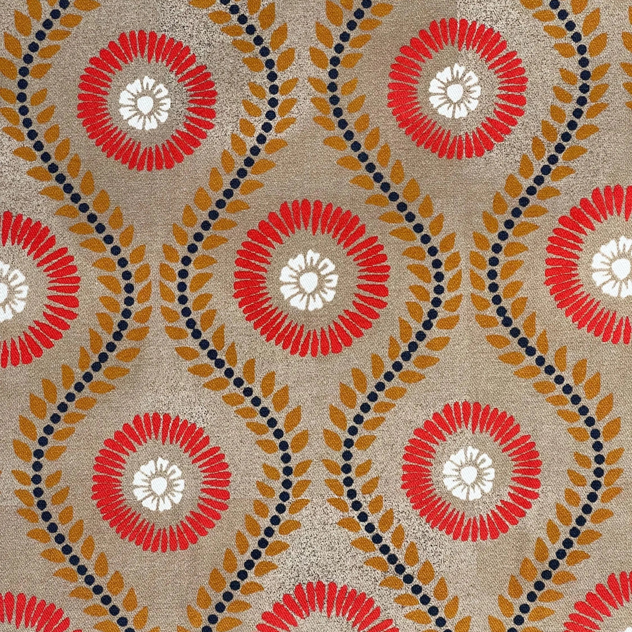 sunburst medallion print fabric in warm vintage tones ideal for upholstery roman blinds and eclectic interiors

