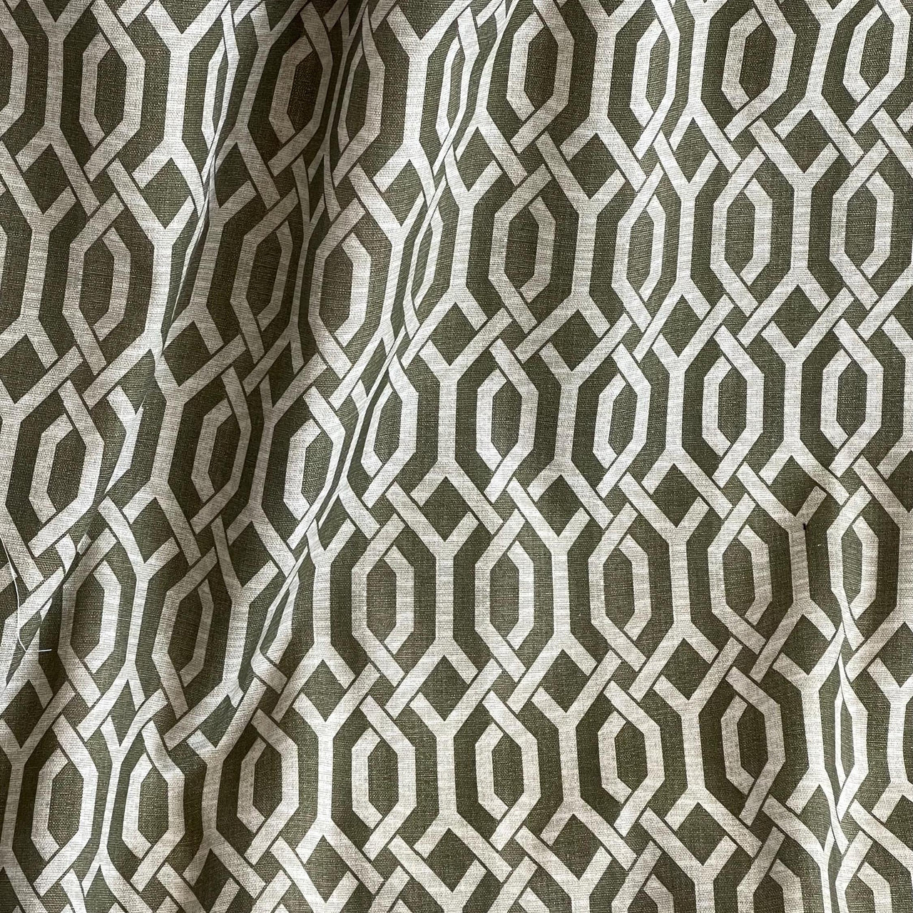Textured drape in geometric green design – modern classic style for curtains