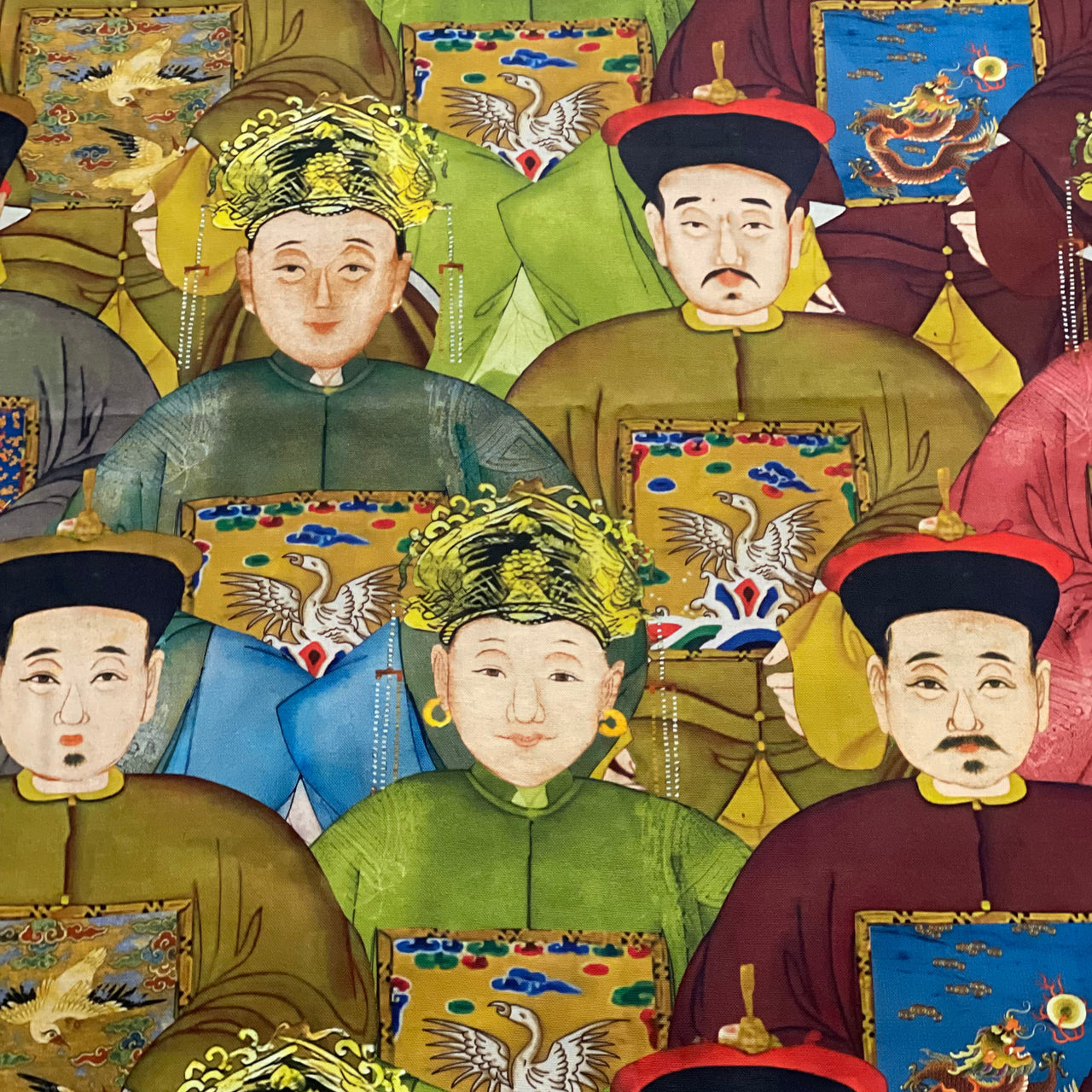 Close-up of Imperial Court cotton fabric showing richly detailed historical portraits, traditional clothing and elaborate ornamental patterns.