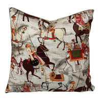 Thumbnail for Square decorative cotton cushion cover with an intricate Indian-inspired print of majestic elephants, horseback riders and colourful traditional costumes against a textured beige-grey background.