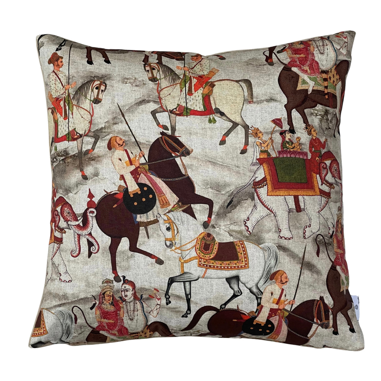 Indian Maharajah cushion cover featuring decorated elephants, traditional horse riders and royal procession scenes in terracotta, red and brown on a stone-grey cotton fabric.
