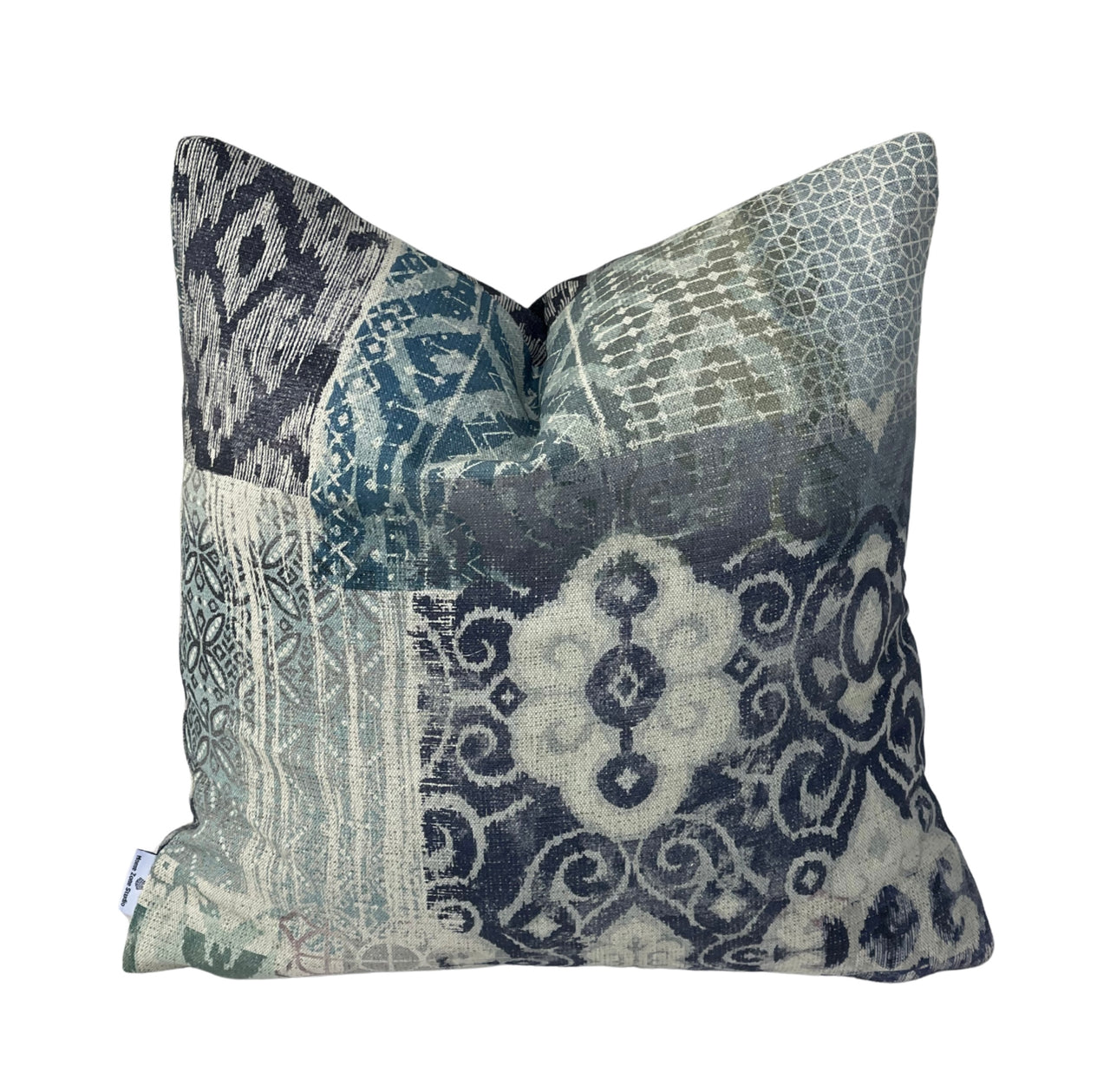 Indigo geometric cotton cushion cover with layered blue, grey and beige decorative motifs.