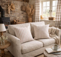 Thumbnail for Indigo red botanical stripe cushion covers styled on a neutral beige sofa