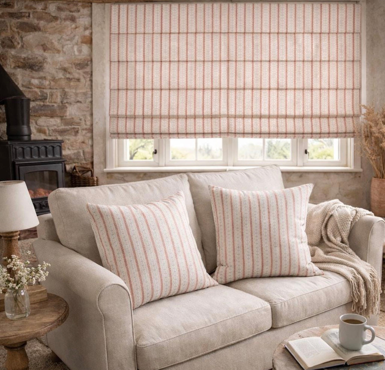 Indigo red botanical stripe cushion covers styled on a neutral beige sofa
