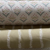 Thumbnail for Three fabric swatches with different patterns stacked on top of each other.