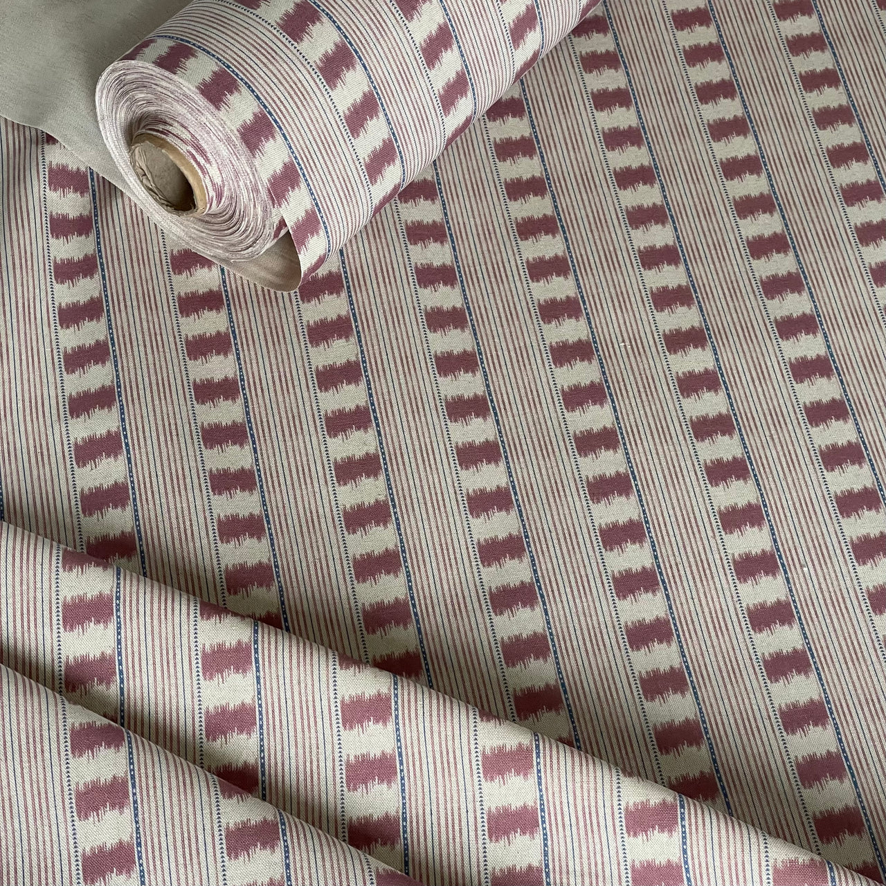 dusty rose stripe fabric close up woven texture detail