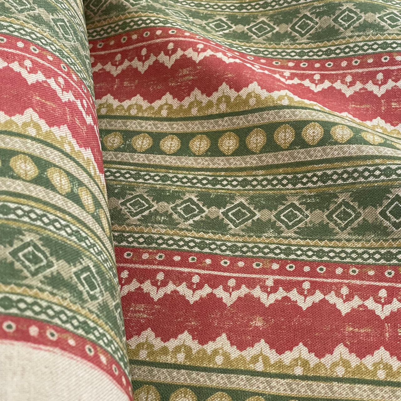 Fabric texture detail showing natural beige linen base