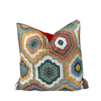 Thumbnail for Handmade Medina Bloom geometric cushion cover featuring colourful layered medallions in mustard yellow, sage green, coral, soft blue and cream on woven cotton blend fabric.
