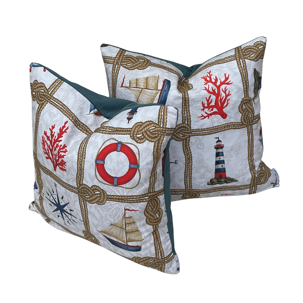 Coordinated nautical cushion covers in square and rectangular sizes featuring sailing boats, rope knots, compass roses and lifebuoys.