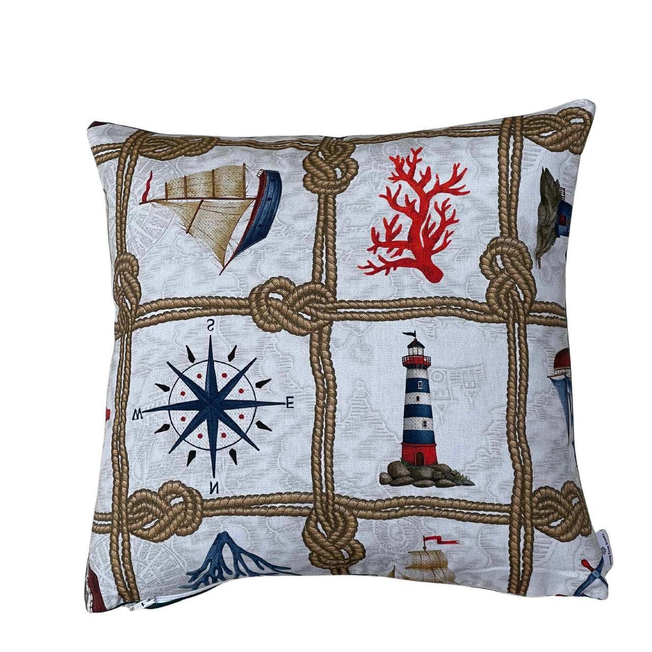 Plain coordinating fabric backing of a handmade nautical cushion cover with concealed zip closure.