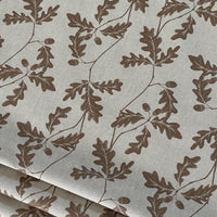 Thumbnail for Beige cotton-linen fabric with brown oak leaf and acorn botanical print – ideal for natural home decor projects