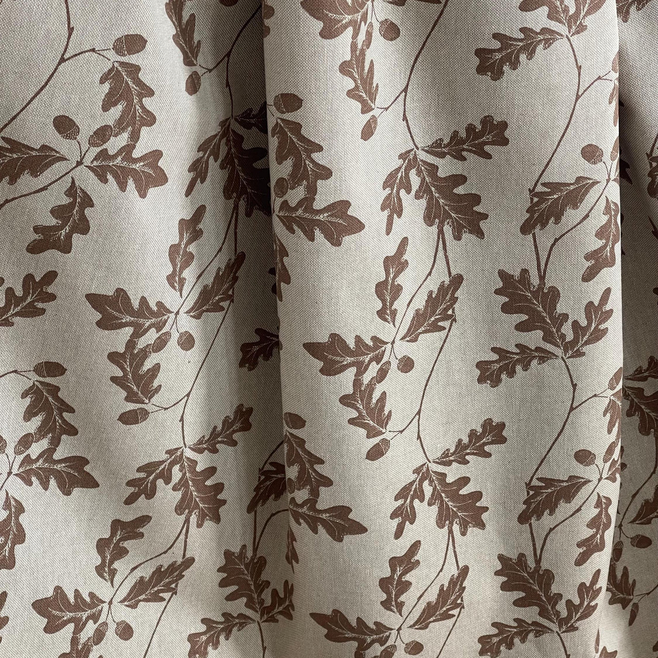 Natural cotton-linen blend fabric with trailing oak leaves and acorns – perfect for curtains and home textiles