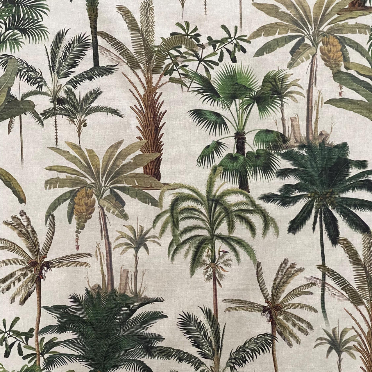 Linen look tropical palm fabric with layered jungle foliage design