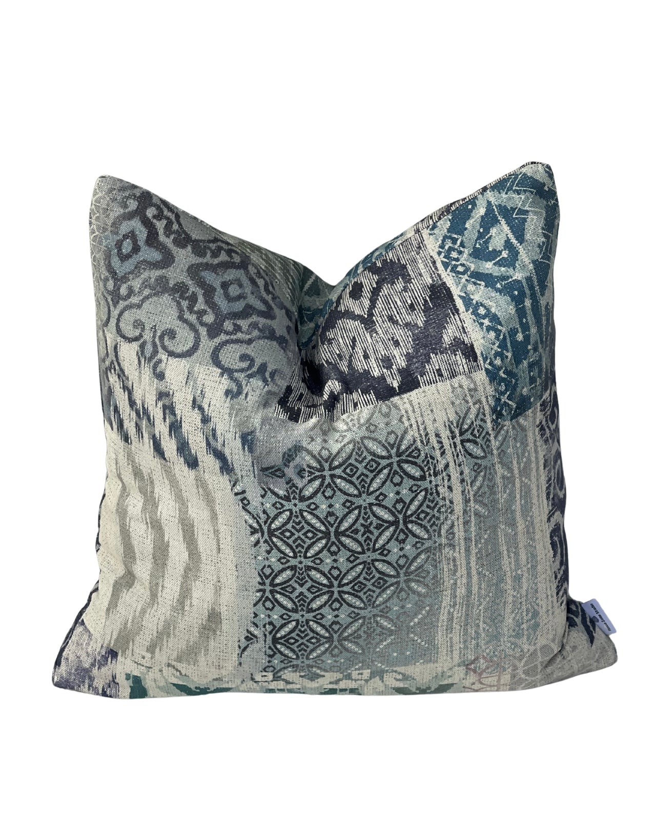 Patchwork linen-look cushion cover featuring indigo, teal, grey and natural geometric patterns.