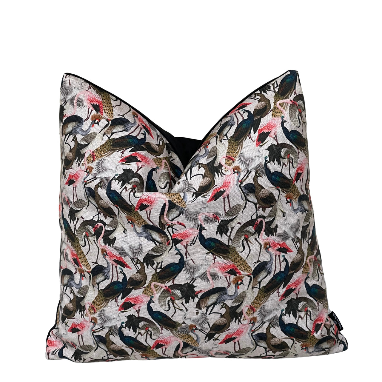 Decorative botanical bird cushion cover with detailed cranes, herons and peacocks in blush pink, navy blue and charcoal grey.
