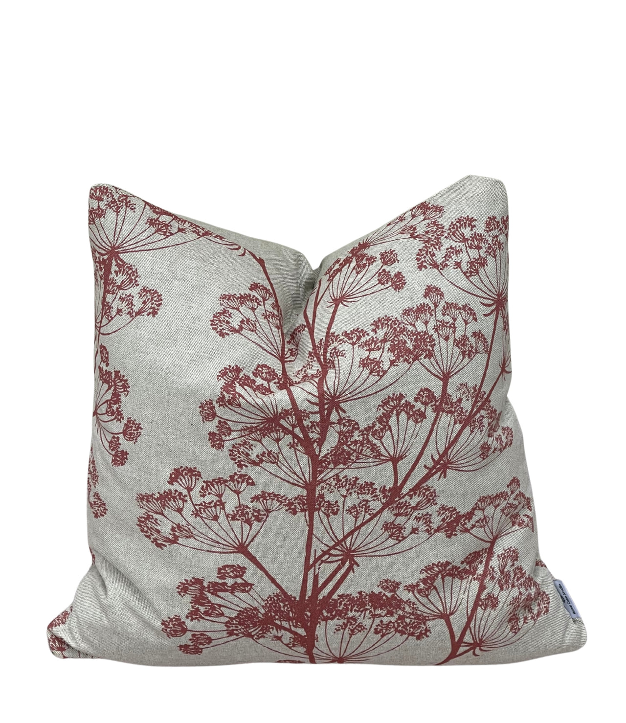 Red cow parsley cushion cover with a botanical print on a warm oatmeal background