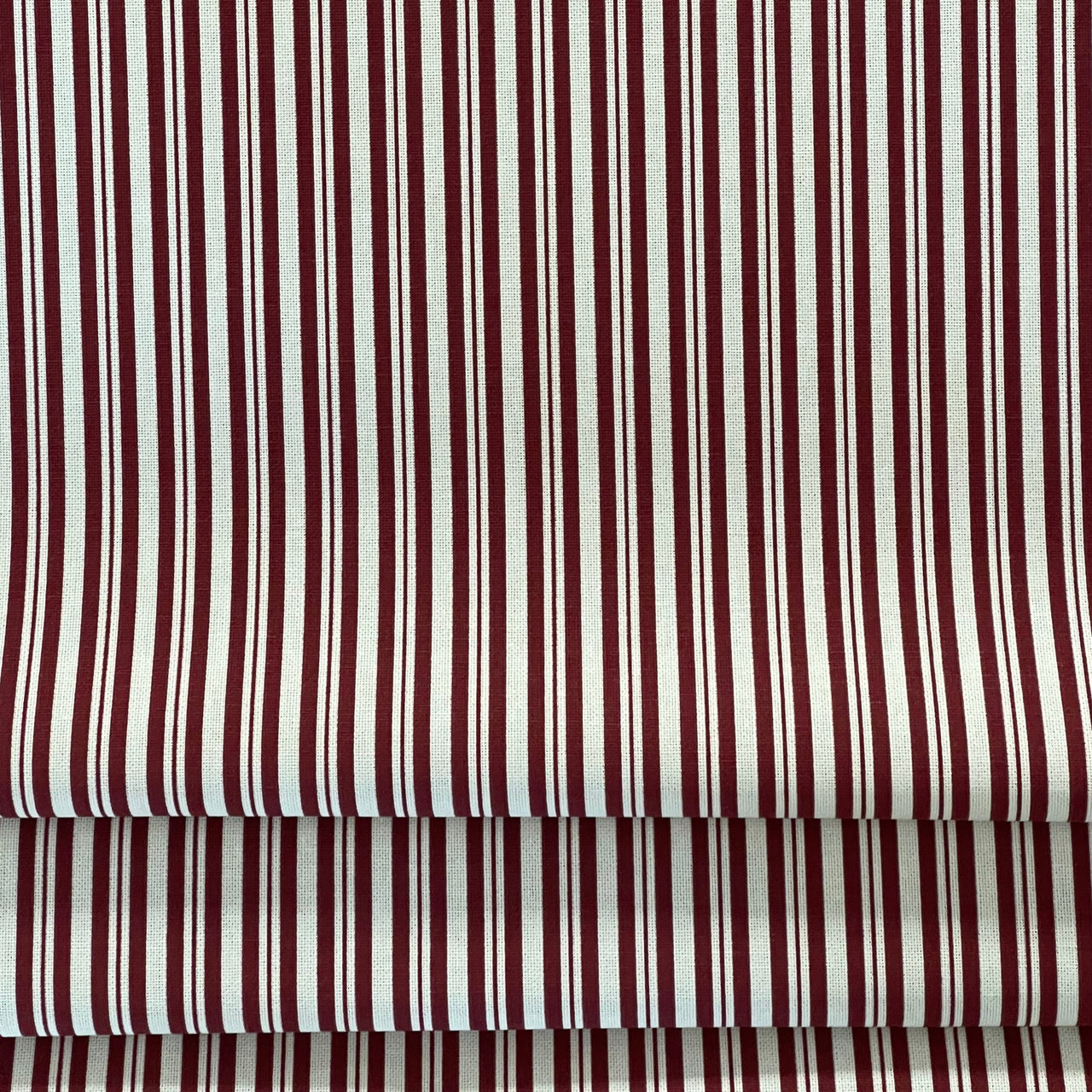 Continuous meter red ticking fabric for crafts and decor
